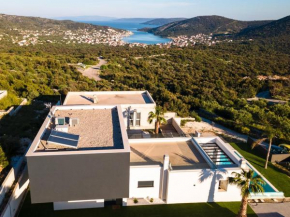 Villa Koko Vinišće with heated pool and sea view